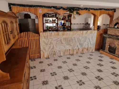 Lounge atau bar di Pensiunea Paradis