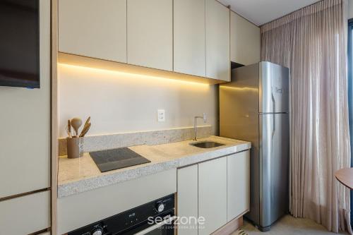 Dapur atau dapur kecil di Acomode-se com estilo e praticidade em Salvador – LIV