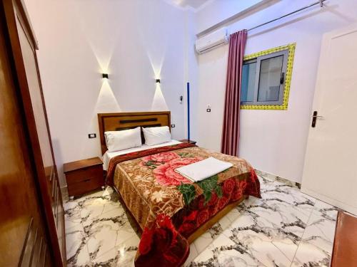 a bedroom with a bed in a room at Bastet Retreat Hotel in Luxor