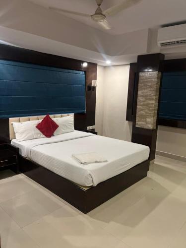 Ένα ή περισσότερα κρεβάτια σε δωμάτιο στο Hotel n pavilion