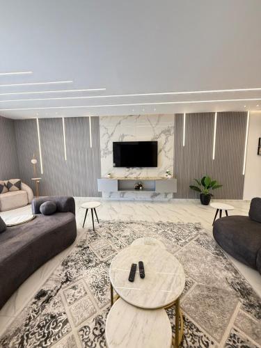 TV a/nebo společenská místnost v ubytování Luxury villa 89 elshick Zayed