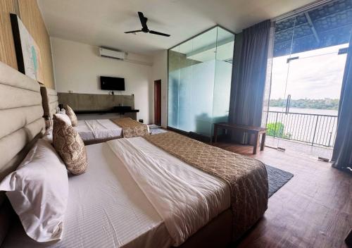 Ένα ή περισσότερα κρεβάτια σε δωμάτιο στο Diyakawa Boutique Hotel