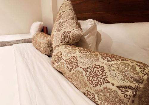 Ένα ή περισσότερα κρεβάτια σε δωμάτιο στο Diyakawa Boutique Hotel