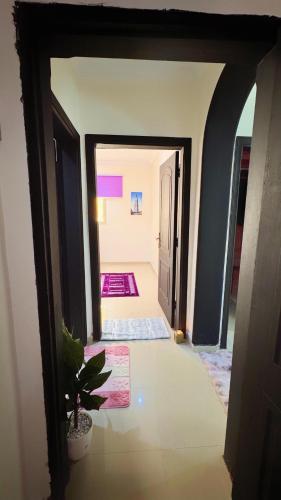 a view of a hallway with a room at درة العروس لونق بيش مسبح in Durat  Alarous