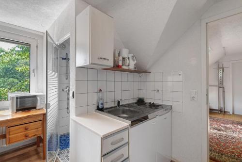 Η κουζίνα ή μικρή κουζίνα στο Gästehaus 22