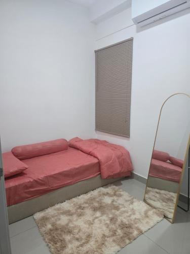 Ένα ή περισσότερα κρεβάτια σε δωμάτιο στο Nine9 Homestay