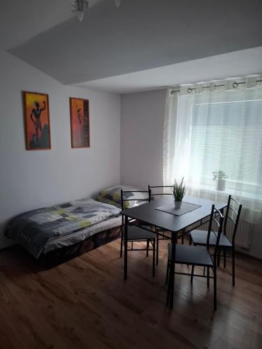 Ένα ή περισσότερα κρεβάτια σε δωμάτιο στο Apartmán Fox 12