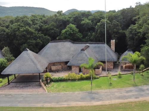 an aerial view of a house with a roof at Kruger Park Lodge Unit 268 & Unit 531 in Hazyview
