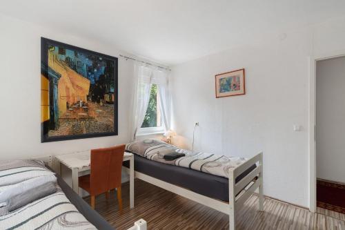 Ένα ή περισσότερα κρεβάτια σε δωμάτιο στο Gästehaus 22