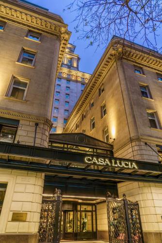 a building with a casa luv sign on it at Casa Lucia Member of Melia Collection in Buenos Aires