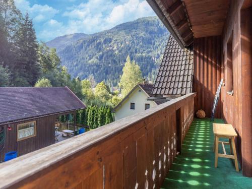an outdoor balcony with a view of a mountain at Apartment Feld am See near Ski Slopes in Feld am See