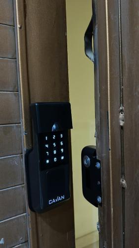 a pay phone is attached to a wall at غرفة نوم مودرن بدخول ذاتي رقم سري in Tabuk