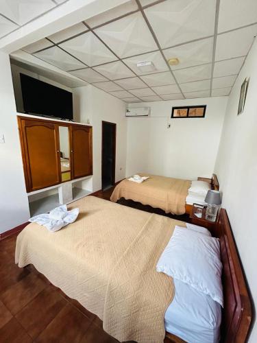 Postel nebo postele na pokoji v ubytování Hotel Mar Azul