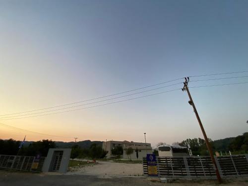 a view of a parking lot at sunset at Vians Olympia Resort in Olympia