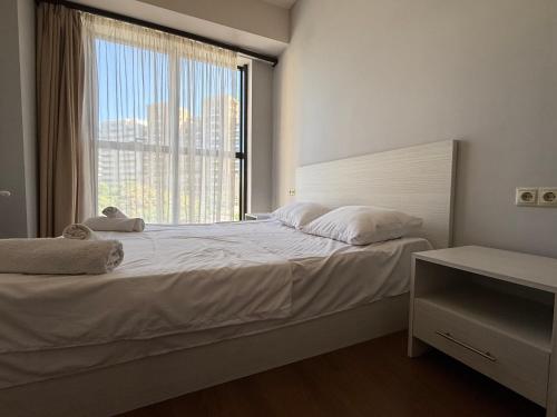 Ένα ή περισσότερα κρεβάτια σε δωμάτιο στο The apartment with the best view