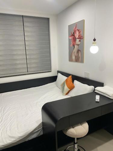 Ένα ή περισσότερα κρεβάτια σε δωμάτιο στο Homestay Huế Ơi