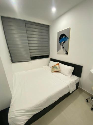 Ένα ή περισσότερα κρεβάτια σε δωμάτιο στο Homestay Huế Ơi