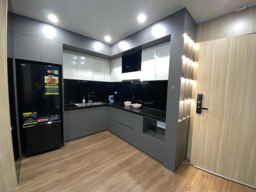 Kuchyň nebo kuchyňský kout v ubytování Huế ơi 5 Homestay Căn hộ 2 Phòng ngủ view Hồ bơi