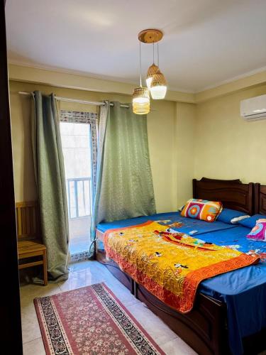 Un pat sau paturi într-o cameră la Golf Porto Marina Alamein North Coast VIP2Bedroom