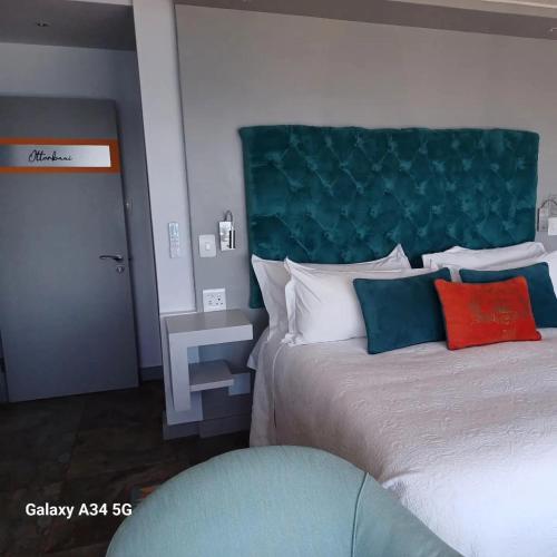 Ένα ή περισσότερα κρεβάτια σε δωμάτιο στο Ocean View Wellness