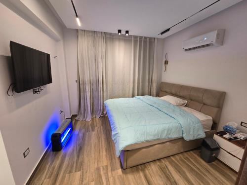 Ένα ή περισσότερα κρεβάτια σε δωμάτιο στο 4 Room VILLA MOUNTAIN VIEW RAS ELHIKMA