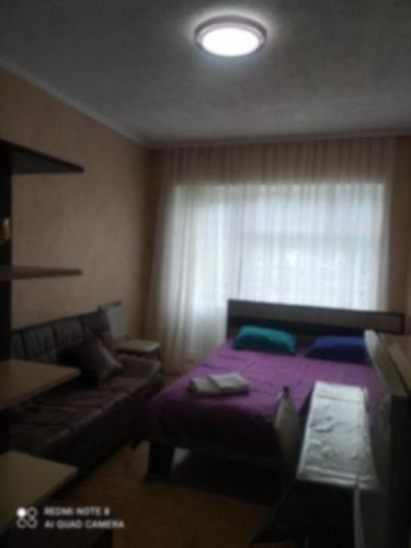Postel nebo postele na pokoji v ubytování Alena's flat