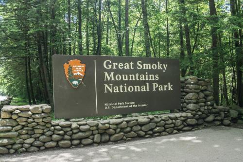 a sign for the great smoky mountains national park at Pinnacle Panorama by American Patriot Getaways in Rocky Grove
