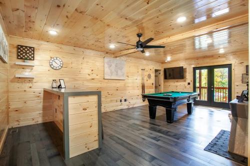 a large room with a pool table in it at Relaxing With a View by American Patriot Getaways in Glade