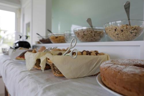 a row of bags of food on a table at Hotel Casino Ridola in Matera