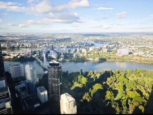 an aerial view of a city and a river at Highgarden Whispers - Skyhigh Apt on the Star in Brisbane