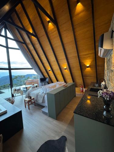 Ένα ή περισσότερα κρεβάτια σε δωμάτιο στο Alto de Urubici