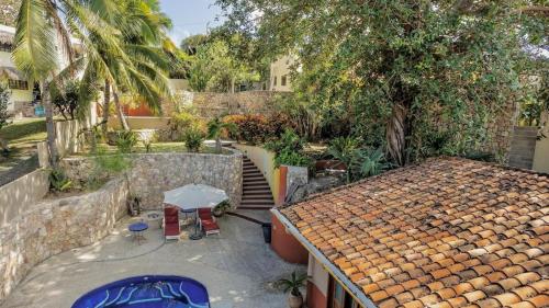 Κήπος έξω από το Las Olas Litibu Apartment