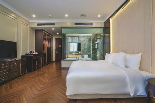 Katil atau katil-katil dalam bilik di Adamo Hotel Hung Yen - Free Daily Access To The Jimjilbang
