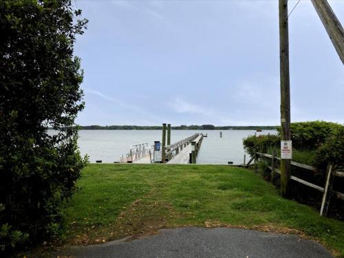 a dock in the middle of a body of water at Sailor Joes in Sherwood