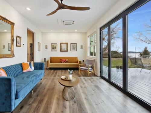 a living room with a couch and a table at Mill Point in Neavitt