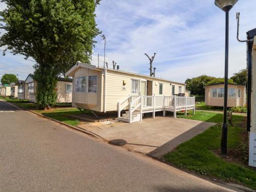 a mobile home on the side of a street at 21 Poplar Avenue in Felixstowe