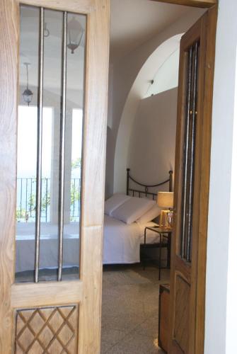 Letto o letti in una camera di Santo Mercurio Country House