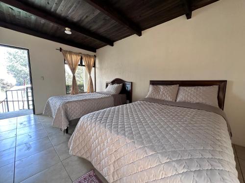 Una cama o camas en una habitación de Mesura B&B