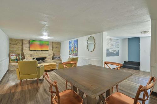 a dining room with a table and chairs at Communal Crashpad-City Card for local biz discounts in Oklahoma City
