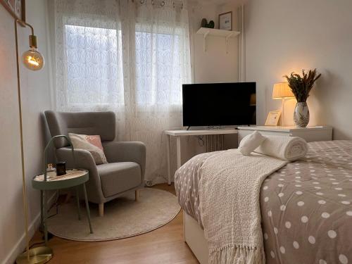 Postel nebo postele na pokoji v ubytování Jolie Chambre Confortable
