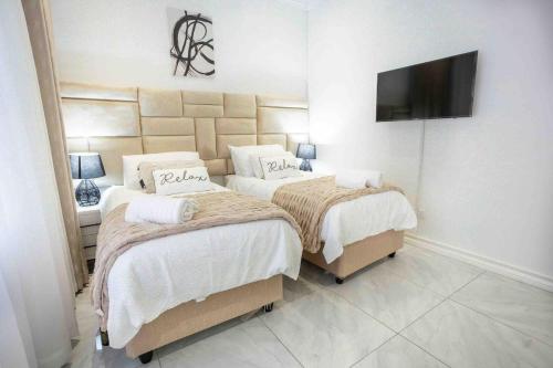 Cama o camas de una habitación en Ocean Seven
