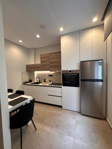 Kuchyň nebo kuchyňský kout v ubytování Sandys Luxury Living