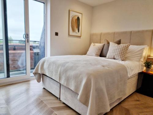 Postel nebo postele na pokoji v ubytování 1 Bed Flat - Sleeps 2 - Parking - Wifi