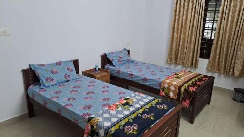 Cama o camas de una habitación en Idukki Nest