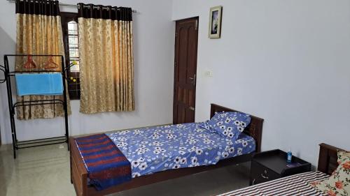 Cama o camas de una habitación en Idukki Nest