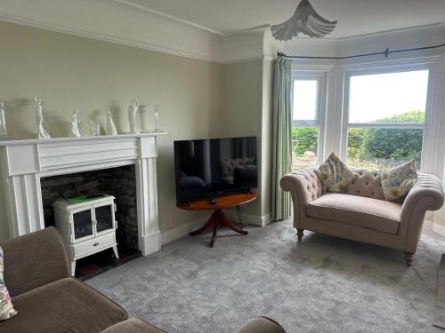 Μια τηλεόραση ή/και κέντρο ψυχαγωγίας στο Sunset Cottage