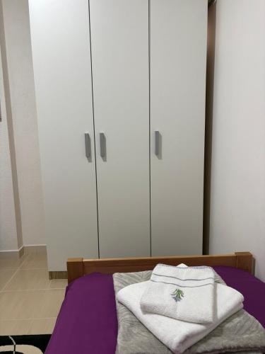 Ένα ή περισσότερα κρεβάτια σε δωμάτιο στο Apartman JANA