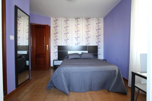 Cama o camas de una habitación en PR Plaza de Galicia