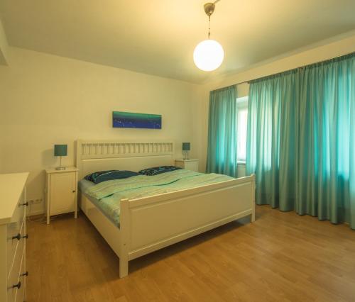 Ένα ή περισσότερα κρεβάτια σε δωμάτιο στο Ferienwohnungen Spiegel - Fewo Mediterran 2