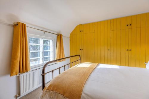 Voodi või voodid majutusasutuse Beau View Cottage toas